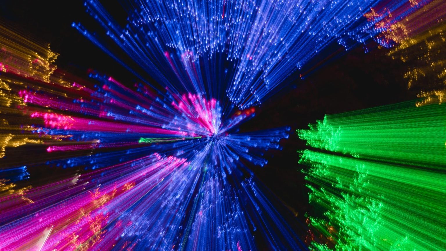 An image of colorful lights in the dark.